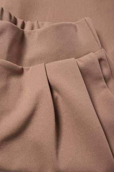 Dames - Basic broek van jersey - mid waist - palazzo - lichtbruin