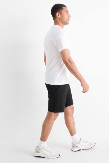 Uomo - Shorts di felpa - nero