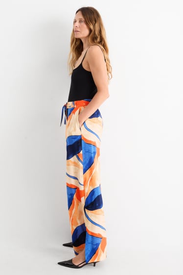 Dames - Pantalon - high waist - wide leg - met patroon - oranje / blauw