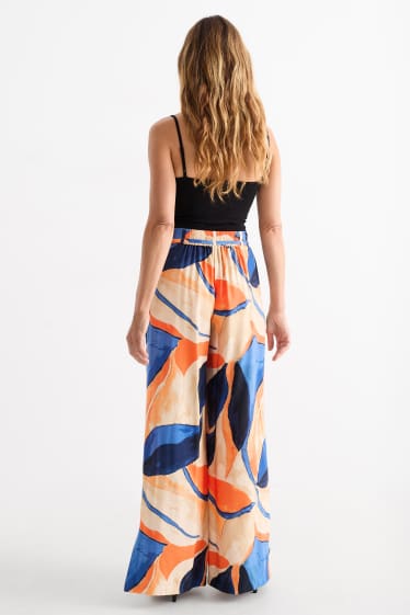 Dames - Pantalon - high waist - wide leg - met patroon - oranje / blauw