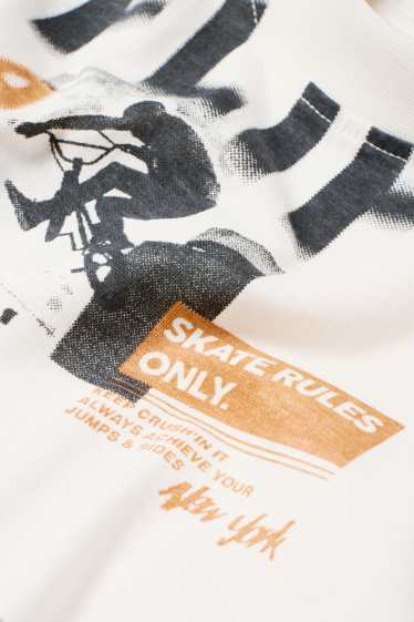 Kinderen: jongens - T-shirt - crème wit