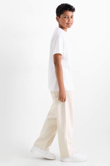 Kinderen: jongens - Baggy jeans - licht beige