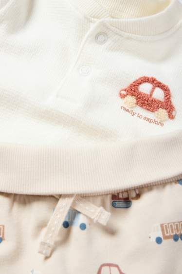 Baby: jongens - Voertuigen - baby-outfit - 2-delig - crème wit