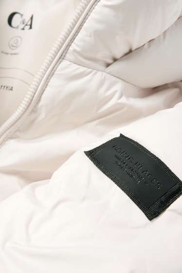 Kinderen: meisjes - Gewatteerde jas met capuchon - licht beige