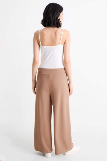 Dames - Basic broek van jersey - mid waist - palazzo - lichtbruin