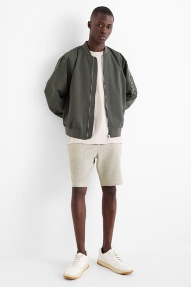 Hommes - Short - finition texturée - beige clair
