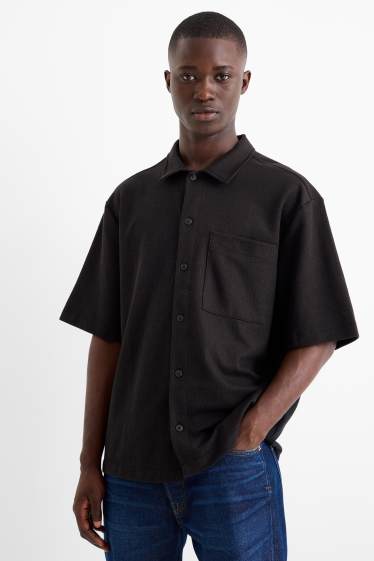 Hommes - Chemise - regular fit - col kent - finition texturée - noir