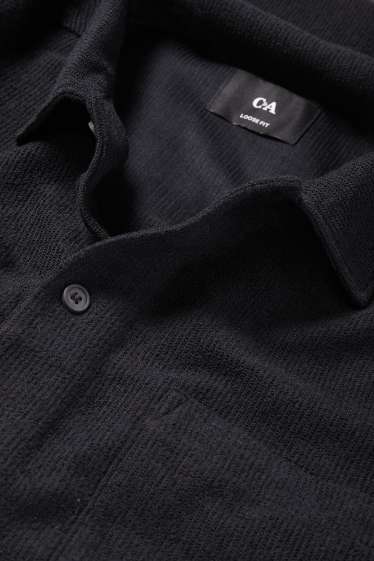 Home - Camisa de punt de mitja - loose fit - coll solapa - acanalada - negre