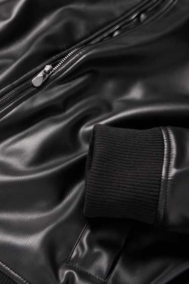 Hommes - Blouson - matière synthétique - noir