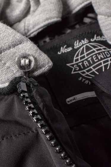 Kinder Buben - Steppjacke mit Kapuze - schwarz