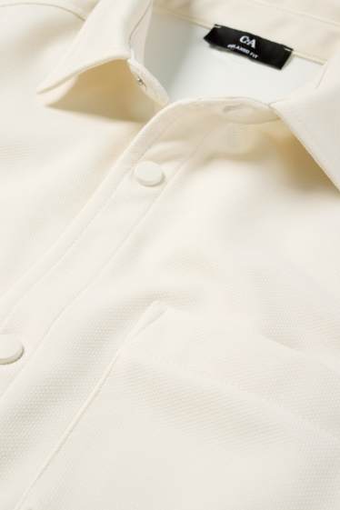 Uomo - Camicia - relaxed fit - collo a revers - tessuto tramato - bianco crema