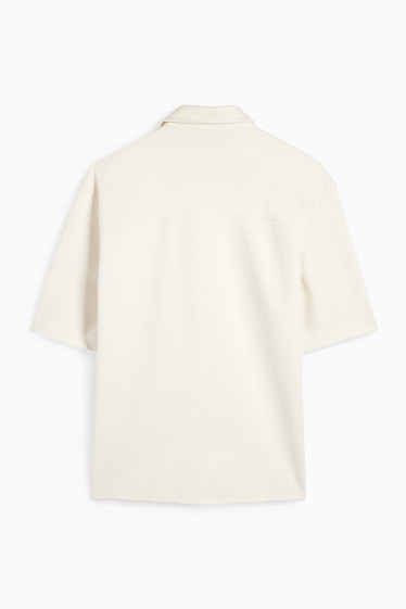 Uomo - Camicia - relaxed fit - collo a revers - tessuto tramato - bianco crema