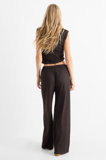 Dames - Broek van jersey - mid waist - wide leg - met structuur - donkerbruin