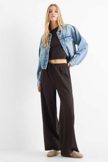 Dames - Broek van jersey - mid waist - wide leg - met structuur - donkerbruin