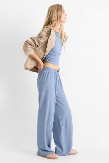 Dames - Broek van jersey - mid waist - wide leg - met structuur - blauw