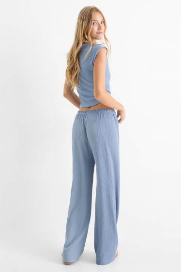 Dames - Broek van jersey - mid waist - wide leg - met structuur - blauw