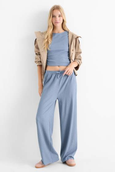 Dames - Broek van jersey - mid waist - wide leg - met structuur - blauw