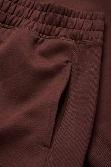 Dona - Pantalons de xandall - marró fosc