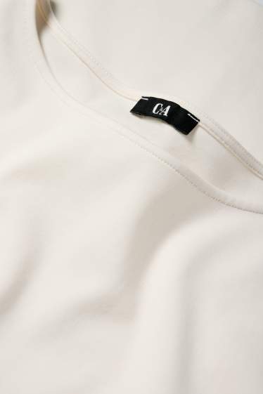 Dames - Longsleeve - crème wit