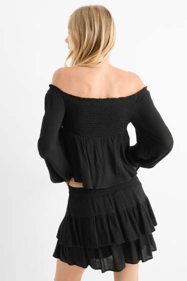 Dames - Korte blouse - gesmokt - zwart