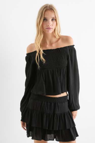 Dames - Korte blouse - gesmokt - zwart