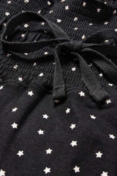 Damen - Umstands-Pyjamahose - gemustert - schwarz