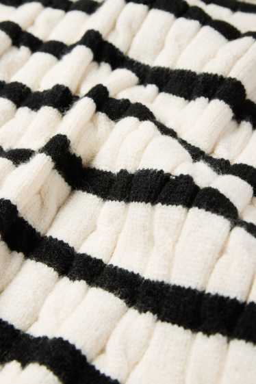 Kinder Mädchen - Pullover - gestreift - Zopfmuster - schwarz / weiss