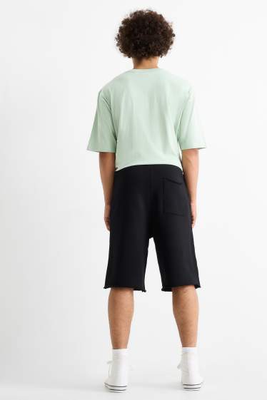 Bărbați - Pantaloni scurți de trening - negru
