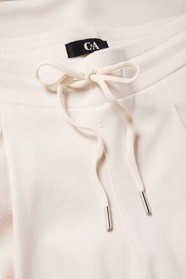 Femei - Pantaloni din jerseu - talie medie - tapered fit - alb-crem
