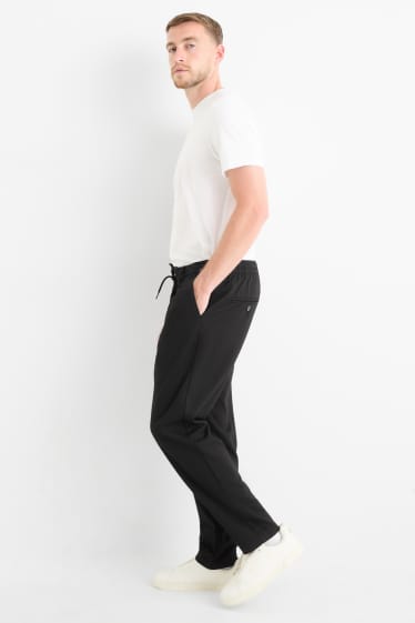 Men - Chinos - tapered fit - black