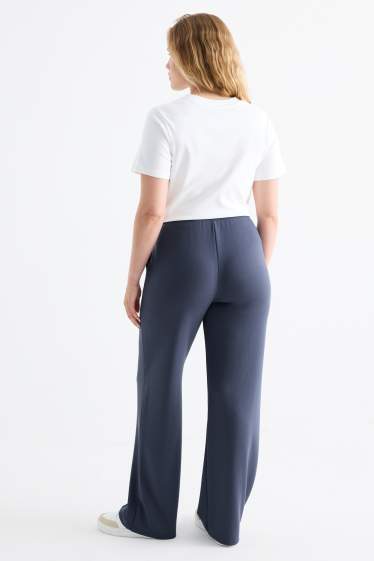 Dámské - Žerzejové kalhoty basic - mid waist - straight fit - modrá-žíhaná
