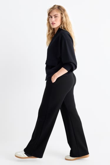 Dámské - Žerzejové kalhoty basic - mid waist - straight fit - černá