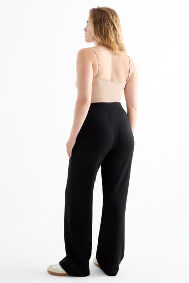 Dámské - Žerzejové kalhoty basic - mid waist - straight fit - černá