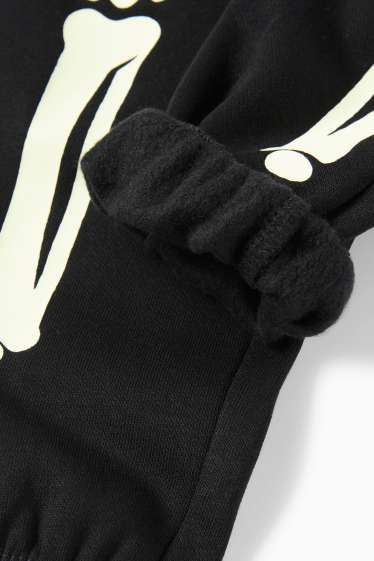 Kinder Buben - Skelett - Jogginghose - Glow in the dark - schwarz