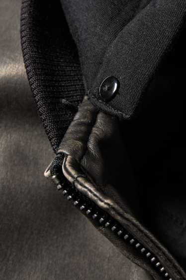 Herren - Jacke mit Kapuze - Lederimitat - schwarz