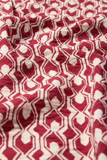 Femmes - Chemisier à encolure en V - à motif - rouge / beige