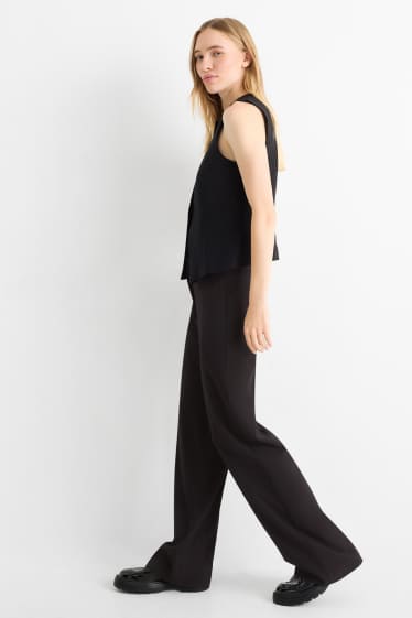 Women - Cloth trousers - low waist - wide leg - black