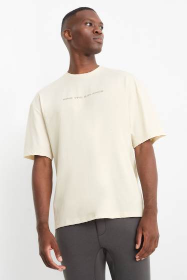 Uomo - T-shirt sportiva - beige chiaro