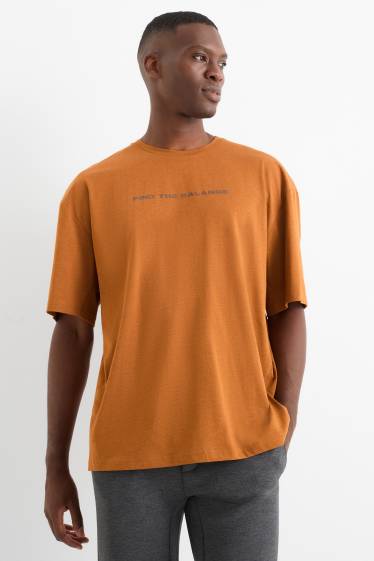 Uomo - T-shirt sportiva - arancio scuro