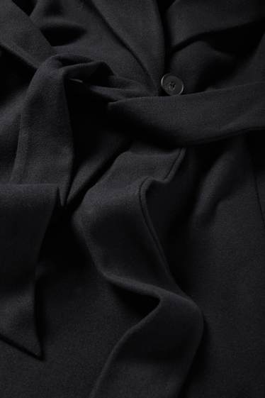 Dona - Abric - negre
