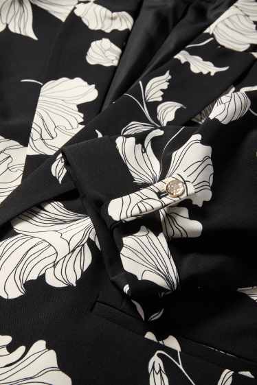 Dames - Lange blazer - relaxed fit - gebloemd - zwart / wit