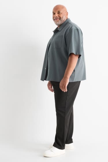 Uomo - Pantaloni chino - tapered fit - nero