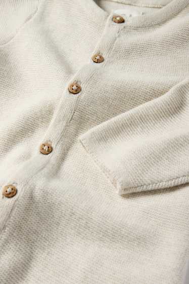 Unisex - Gebreide babyjumpsuit - geribd - licht beige