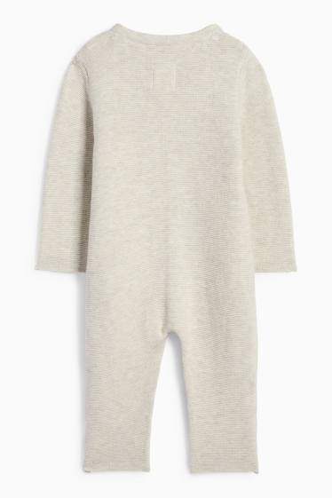 Unisex - Gebreide babyjumpsuit - geribd - licht beige