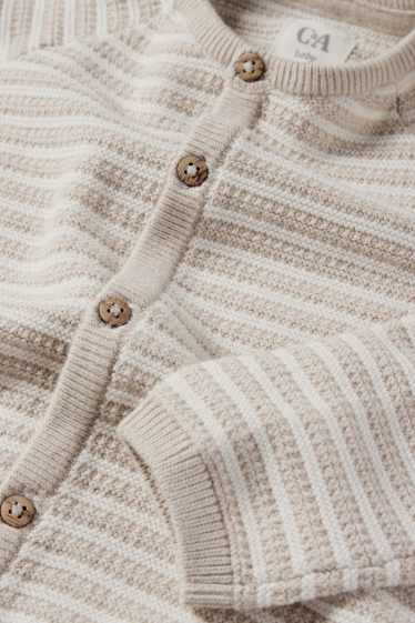 Unisex - Babyvest - gestreept - met structuur - licht beige