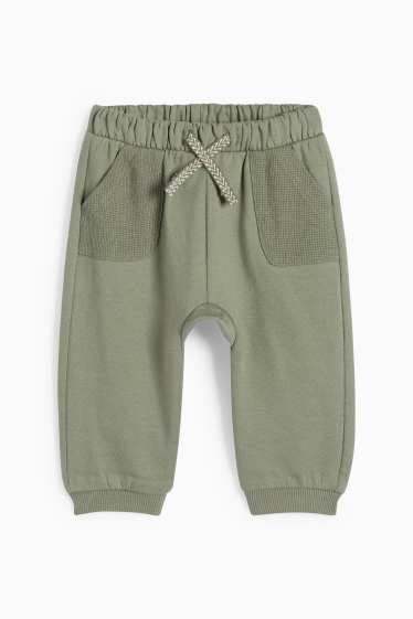 Baby: jongens - Dieren uit de oertijd - baby-outfit - 2-delig - lichtgroen