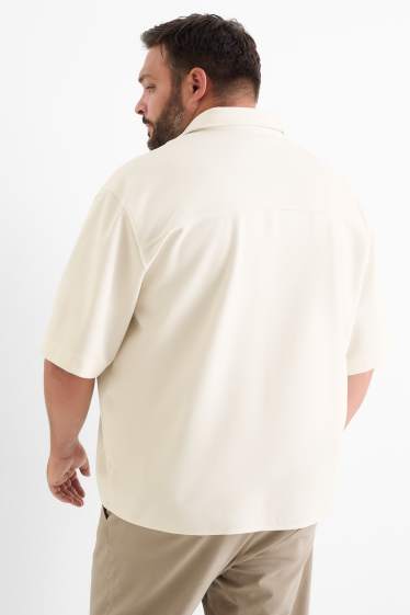 Home - Camisa - relaxed fit - coll solapa - texturada - beix clar