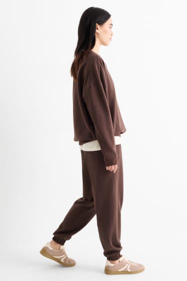 Donna - Pantaloni sportivi - marrone scuro