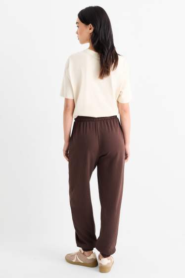 Donna - Pantaloni sportivi - marrone scuro