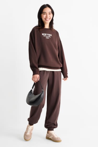 Donna - Pantaloni sportivi - marrone scuro